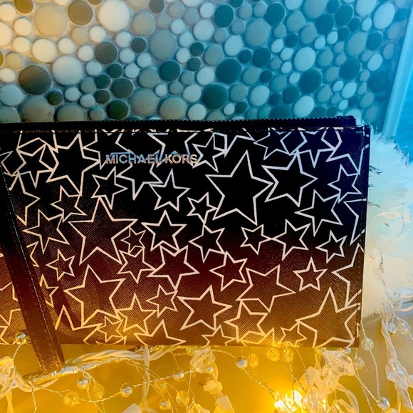 Michael Kors Handbags - Michael Kors Wristlet in Black w white stars BN